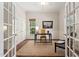 Office with hardwood flooring, a neutral color palette, and bright natural light at 915 Chapanoke Rd, Raleigh, NC 27603