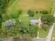 An aerial shot features the roof, large garden plot, and the home's surroundings at 100 Martindale Dr, Youngsville, NC 27596