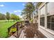 Inviting back deck featuring outdoor seating, a grill, and a view of the yard at 100 Martindale Dr, Youngsville, NC 27596