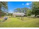 Spacious fenced-in backyard featuring a deck and patio, perfect for outdoor entertaining at 100 Martindale Dr, Youngsville, NC 27596