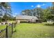 Spacious fenced backyard with lots of room for activities and outdoor living at 100 Martindale Dr, Youngsville, NC 27596