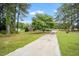 Beautiful single story brick home with mature trees and a long private drive in established neighborhood at 100 Martindale Dr, Youngsville, NC 27596