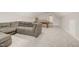 Comfortable living space featuring a cozy sectional couch, a pool table, and ample open space at 100 Martindale Dr, Youngsville, NC 27596