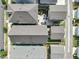 Aerial view of neighborhood with well-manicured lawns, backyard patios, and lush greenery at 1006 Whistler St, Durham, NC 27713