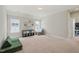 Bonus room featuring carpeted flooring, natural lighting, and adaptable spaces for different activities at 1006 Whistler St, Durham, NC 27713