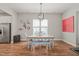 Cozy dining area featuring a unique light fixture and modern decor at 1006 Whistler St, Durham, NC 27713