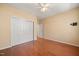 Bedroom featuring hardwood floors, closet, ceiling fan at 102 Mikaila Dr, Gibsonville, NC 27249