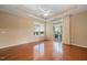 Bedroom showcasing hardwood floors, a ceiling fan, natural light, and neutral wall paint at 102 Mikaila Dr, Gibsonville, NC 27249