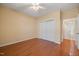 Bedroom featuring hardwood floors, ceiling fan, and closet at 102 Mikaila Dr, Gibsonville, NC 27249