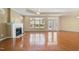 Spacious living room with fireplace and hardwood flooring at 102 Mikaila Dr, Gibsonville, NC 27249