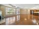 Expansive living area with hardwood floors, fireplace, and abundant natural light at 102 Mikaila Dr, Gibsonville, NC 27249