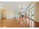 Inviting living area showcasing a fireplace, abundant natural light, and an open layout at 102 Mikaila Dr, Gibsonville, NC 27249
