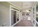 Screened in porch with sliding door, ceiling fan, and views of backyard at 102 Mikaila Dr, Gibsonville, NC 27249