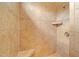 Tiled shower with built-in seat and convenient shower niche at 102 Mikaila Dr, Gibsonville, NC 27249