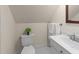 Bathroom with clean white vanity and fixtures at 1105 Tazwell Pl, Raleigh, NC 27612