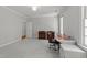 Spacious bedroom with neutral walls, plush carpeting, and a dedicated desk area for work at 1105 Tazwell Pl, Raleigh, NC 27612