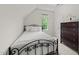 Bright bedroom with lots of natural light and hardwood floors at 1105 Tazwell Pl, Raleigh, NC 27612