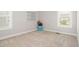Bright bedroom with two windows and neutral carpet at 1109 Hemby Ridge Ln, Morrisville, NC 27560