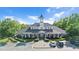 Large clubhouse with brick accents, well-kept landscaping, and ample parking on a sunny day at 1109 Hemby Ridge Ln, Morrisville, NC 27560