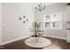 Cozy dining area with chandelier, table, and bright window at 1109 Hemby Ridge Ln, Morrisville, NC 27560