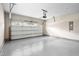 Epoxy floor garage with a white garage door at 1109 Hemby Ridge Ln, Morrisville, NC 27560