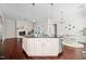 Spacious kitchen with stainless appliances opens up to a fireplace and dining area at 1109 Hemby Ridge Ln, Morrisville, NC 27560