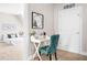 Cozy home office area with a desk, stylish chair, and a view into the bedroom at 1109 Hemby Ridge Ln, Morrisville, NC 27560