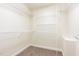 Walk-in closet featuring wire shelving and carpet flooring at 112 Avent Pines Ln, Holly Springs, NC 27540