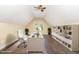 Bright office featuring hardwood floors, built in shelves, and natural lighting at 112 Avent Pines Ln, Holly Springs, NC 27540