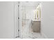 Hallway bathroom featuring marble floors, quartz countertops, and walk-in shower at 113 Pueblo Dr, Louisburg, NC 27549