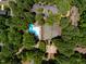 Aerial view showcasing the pool, tennis courts and playground in the community at 113 Twisted Oak Pl, Durham, NC 27705