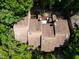 An aerial view of rooftops of townhouses, trees, and parking lots at 113 Twisted Oak Pl, Durham, NC 27705