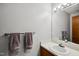 Bathroom with a large mirror and soft towel racks at 113 Twisted Oak Pl, Durham, NC 27705