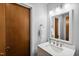 This bathroom has a sleek vanity with great lighting, a mirror, and modern fixtures at 113 Twisted Oak Pl, Durham, NC 27705