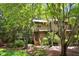 Inviting townhouse surrounded by lush trees and beautiful landscaping at 113 Twisted Oak Pl, Durham, NC 27705