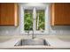 Bright kitchen with window view to the backyard at 113 Twisted Oak Pl, Durham, NC 27705
