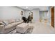 Spacious carpeted living room with dining area at 113 Twisted Oak Pl, Durham, NC 27705