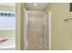 Close up view of a glass shower with tile surround at 1205 Magnolia Hill Rd, Garner, NC 27529