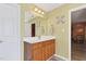 Bathroom vanity with sink and large mirror at 1205 Magnolia Hill Rd, Garner, NC 27529