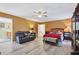 Bedroom with a comfortable sitting area, offering a relaxing retreat at 1205 Magnolia Hill Rd, Garner, NC 27529