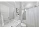 Well-lit bathroom with shower and tub combination and a cultured marble countertop and sink at 129 Damsire Way, Cary, NC 27513