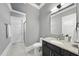 A bathroom with vanity, toilet and tile shower at 129 Damsire Way, Cary, NC 27513