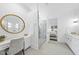 Bright bathroom with a glass enclosed shower, double vanities, and modern fixtures at 129 Damsire Way, Cary, NC 27513