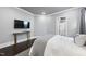 Bedroom with tv and bedside table at 129 Damsire Way, Cary, NC 27513