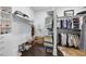 Walk-in closet with custom shelving for ample storage at 129 Damsire Way, Cary, NC 27513