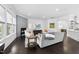 Spacious living room with modern fireplace, comfortable seating, and ample natural light at 129 Damsire Way, Cary, NC 27513