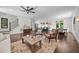 Bright living space showcasing hardwood floors and an open layout to the modern kitchen and dining at 1317 Fay St, Durham, NC 27701