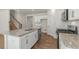 Spacious kitchen featuring granite countertops, stainless steel appliances, and ample storage space at 136 Pisgah St, Sanford, NC 27330