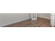 Bright office with hardwood floors, white trim, and a glass-paneled door at 136 Pisgah St, Sanford, NC 27330