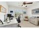 A cozy office featuring neutral walls and carpeting with a ceiling fan and a bright window for ample natural light at 142 Scarlet Oak Run, Clayton, NC 27520